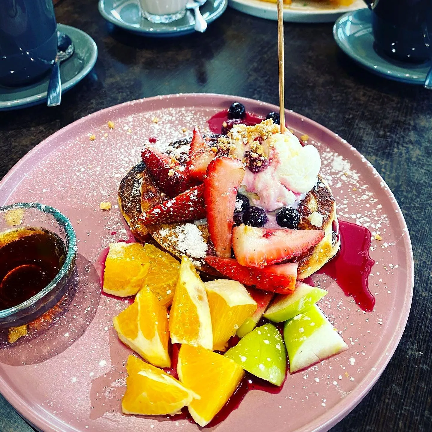 Plate piled with fresh fruit