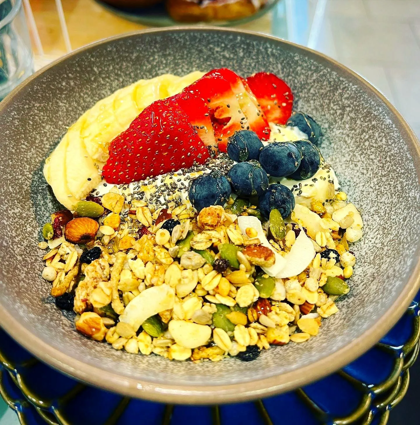 Granola bowl with strawberry, banana and blueberries
