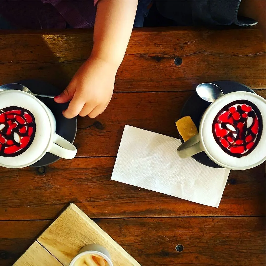Kids drinks in cartoon character cups