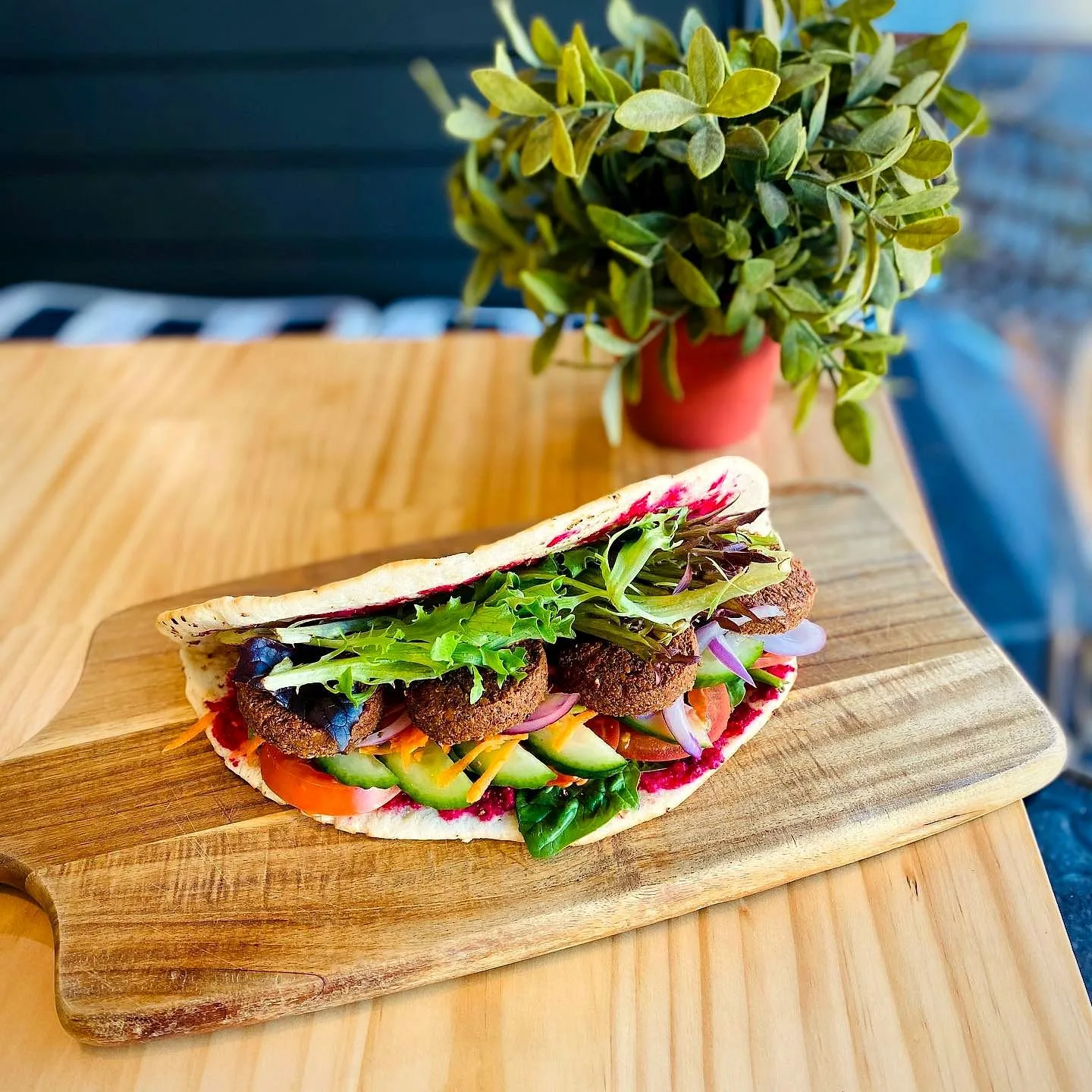 Loaded wrap on a serving board